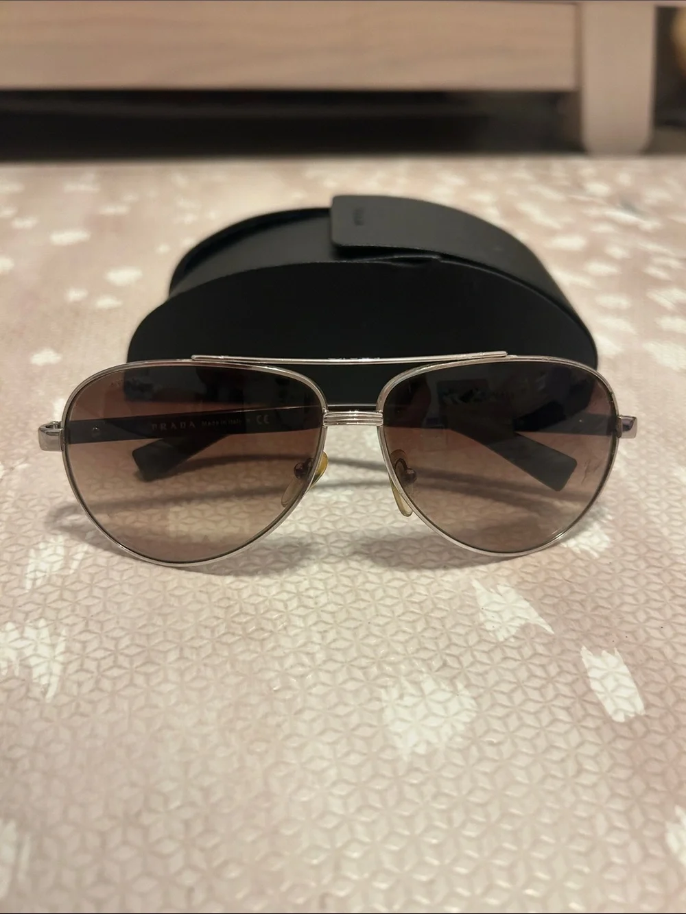 Prada Silver Frame Sunglasses with Brown Gradient Lenses